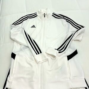 Adidas Women’s Track Suit size Large. Both zip up and pants included.